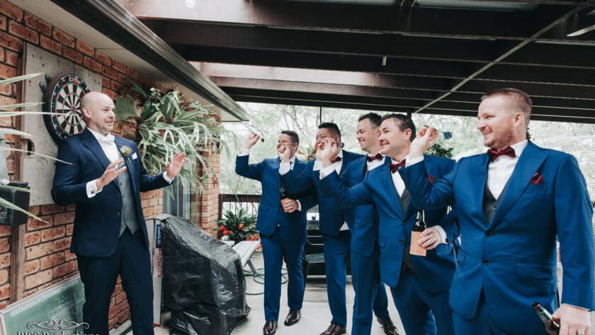 funny photo - Archery on Groom