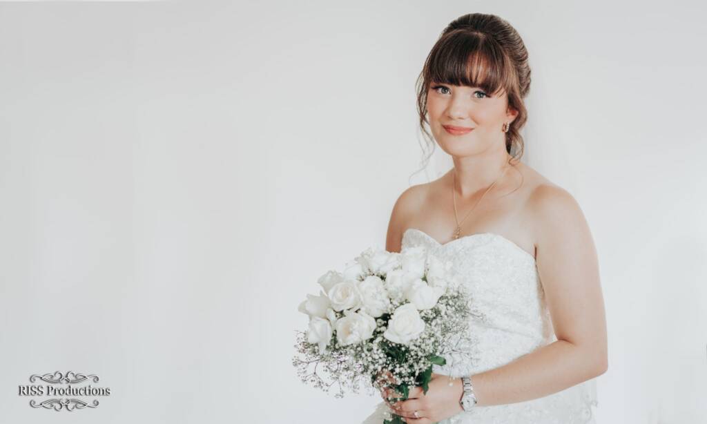 The Cropped Sideways Swayed Bridal Pose with Bouquet 