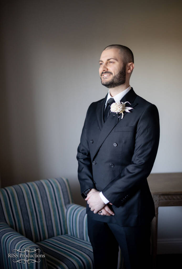 The Handsome Groom in His Classic Attire 