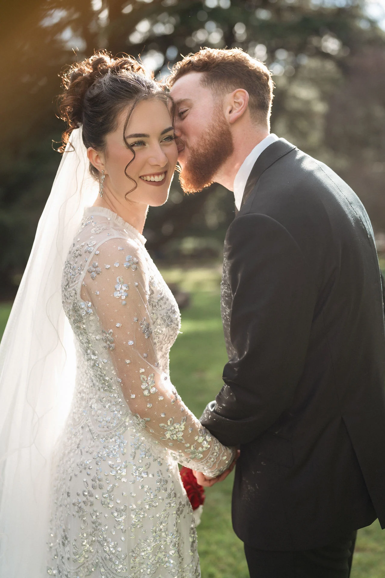 Boe and Jeremy sharing a kiss on their wedding day at The Robertson Hotel