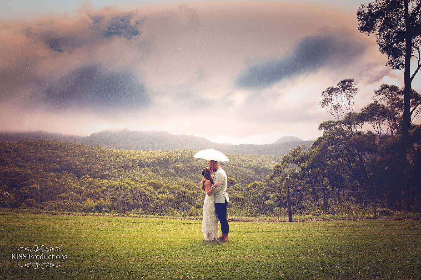 Brooke and Ben at golden hour with mountain views