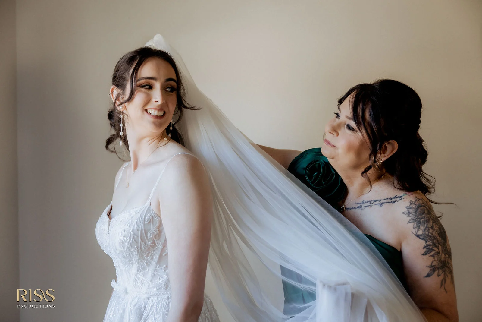 Bride having her veil placed while getting ready, Southern Highlands wedding