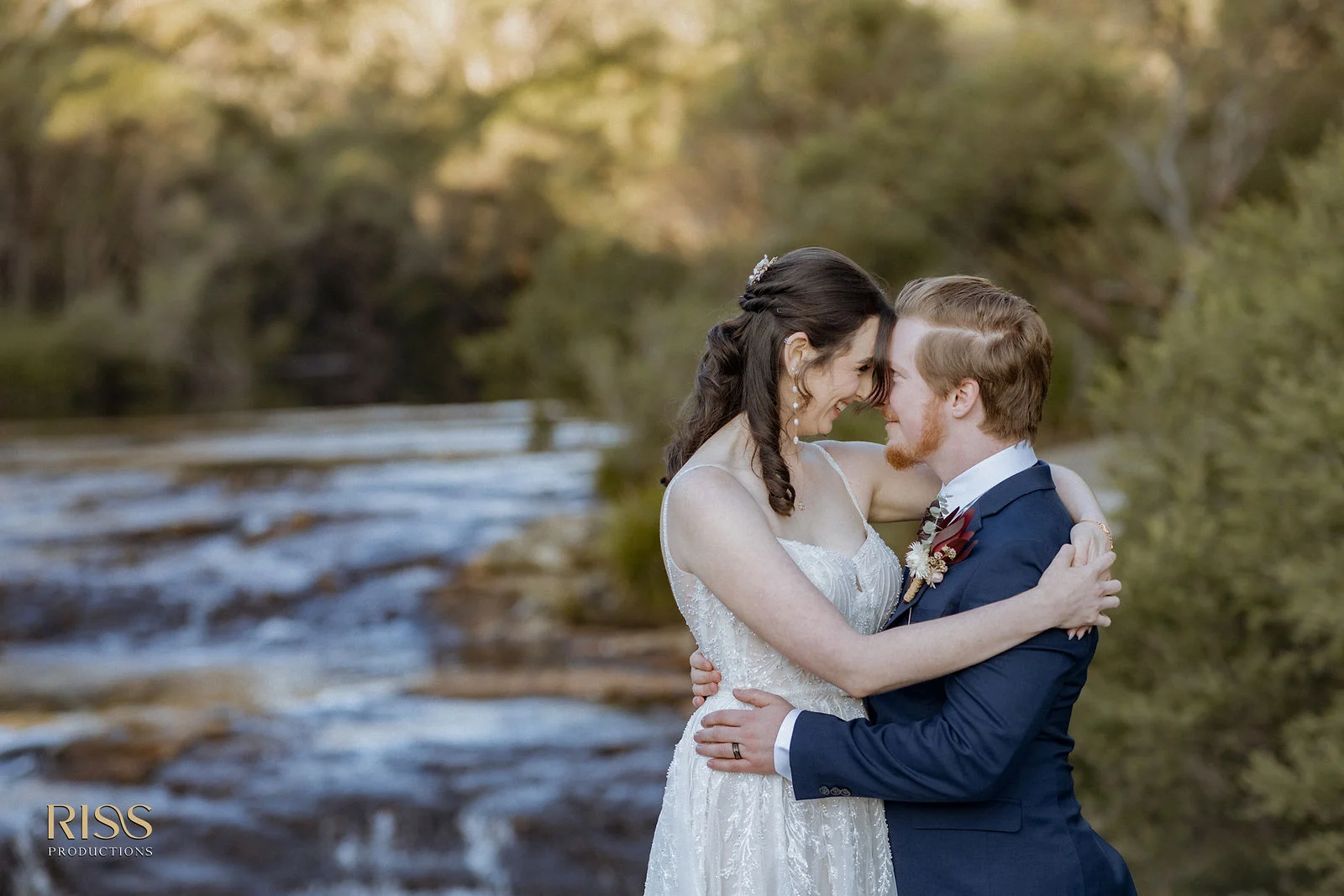 Caitlin and Jakub couple portrait by the river in the Southern Highlands