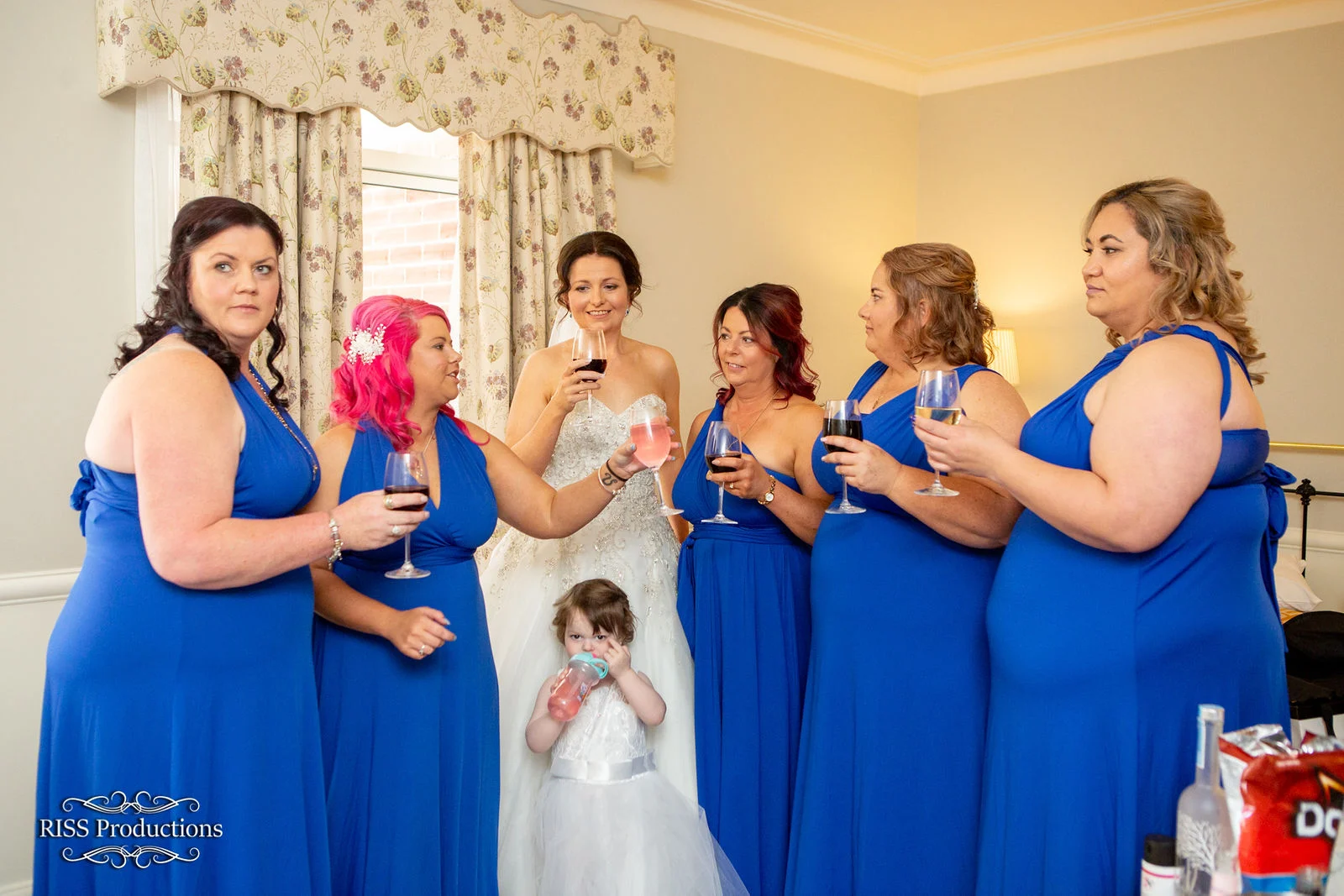 Bride with her bridesmaids in royal blue at The Hydro Majestic
