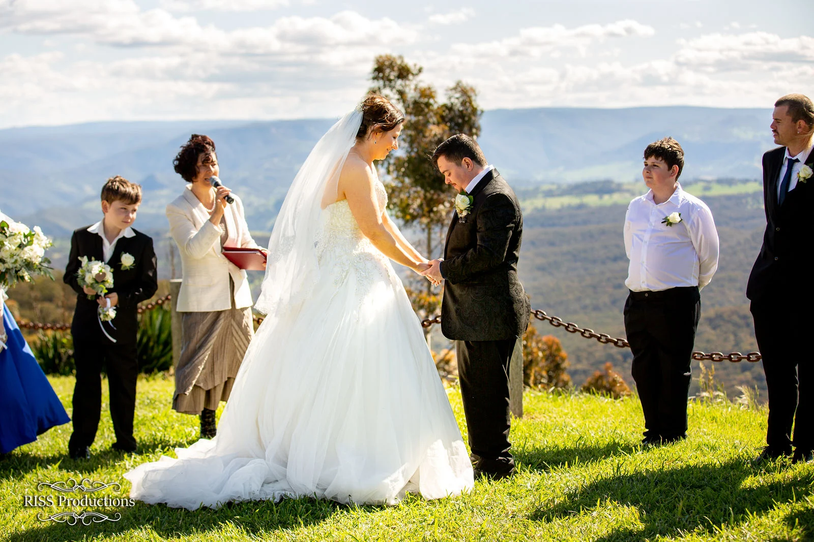Dannielle and Christian exchanging vows with Blue Mountains views at The Hydro Majestic