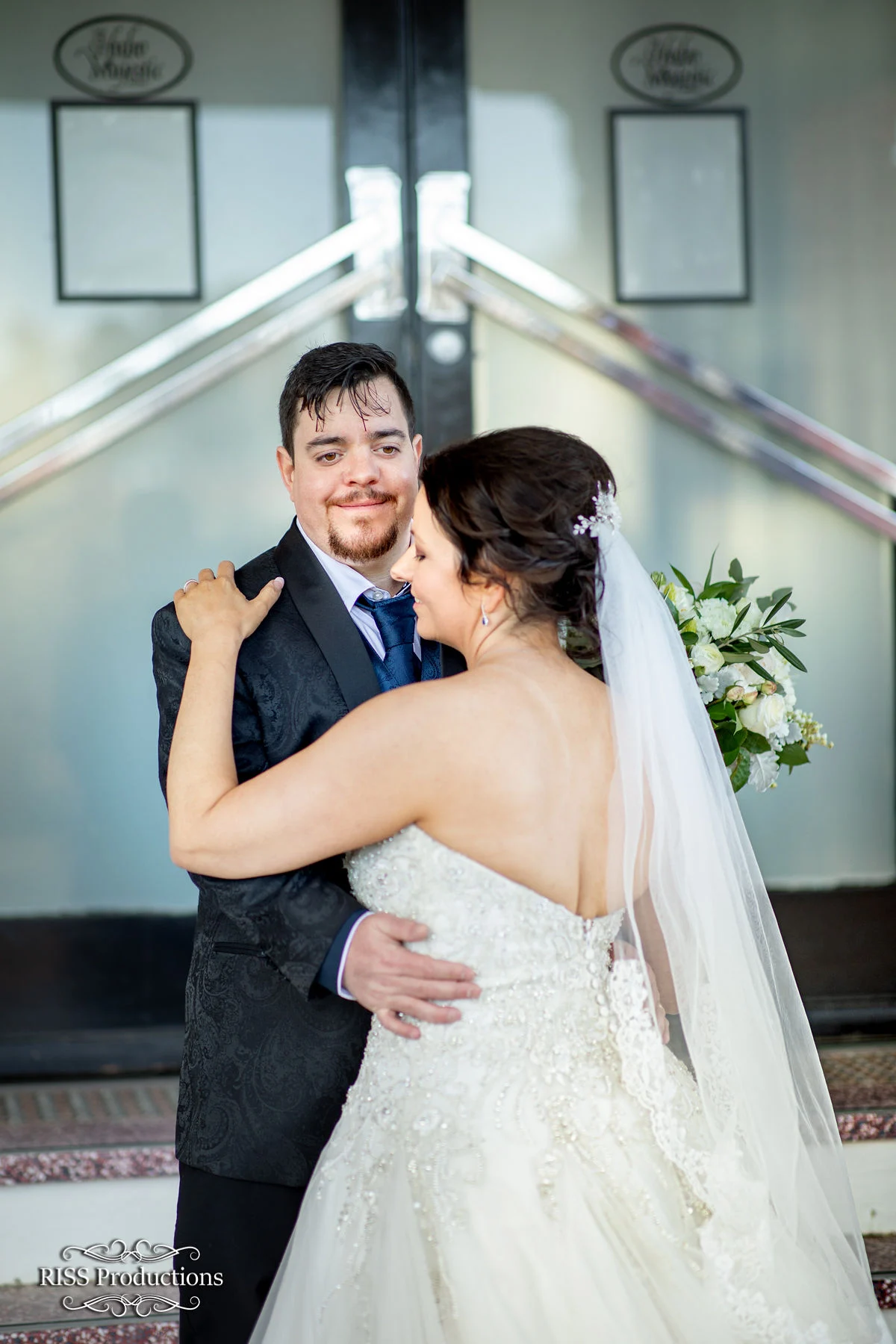 Dannielle and Christian embracing in the doorway of The Hydro Majestic