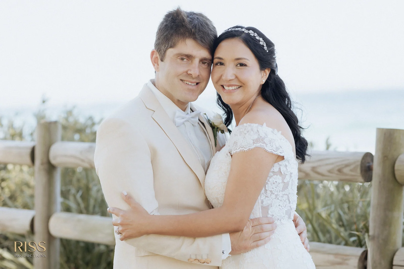 Belinda and David smiling together on their Wollongong wedding day