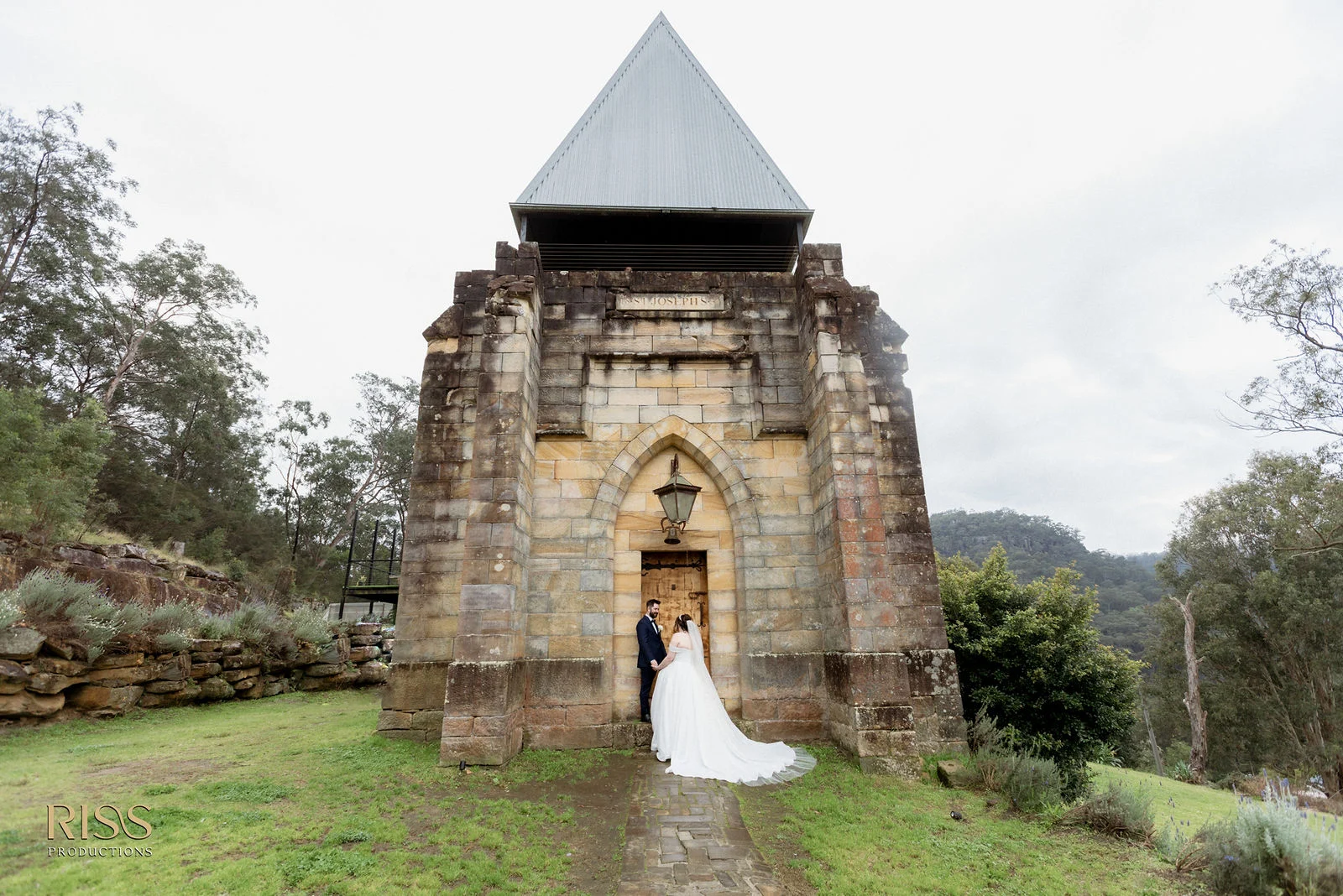 Erin and Michael in front of the chapel at St Joseph's Guest House