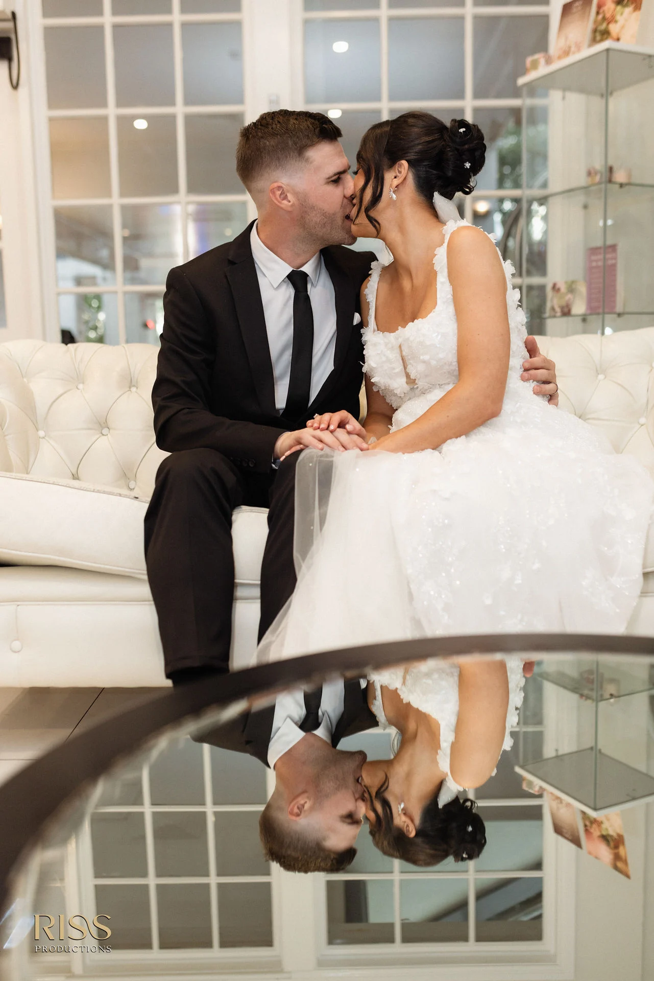 Lana and Blake sharing a kiss at Crowne Plaza Hawkesbury Valley