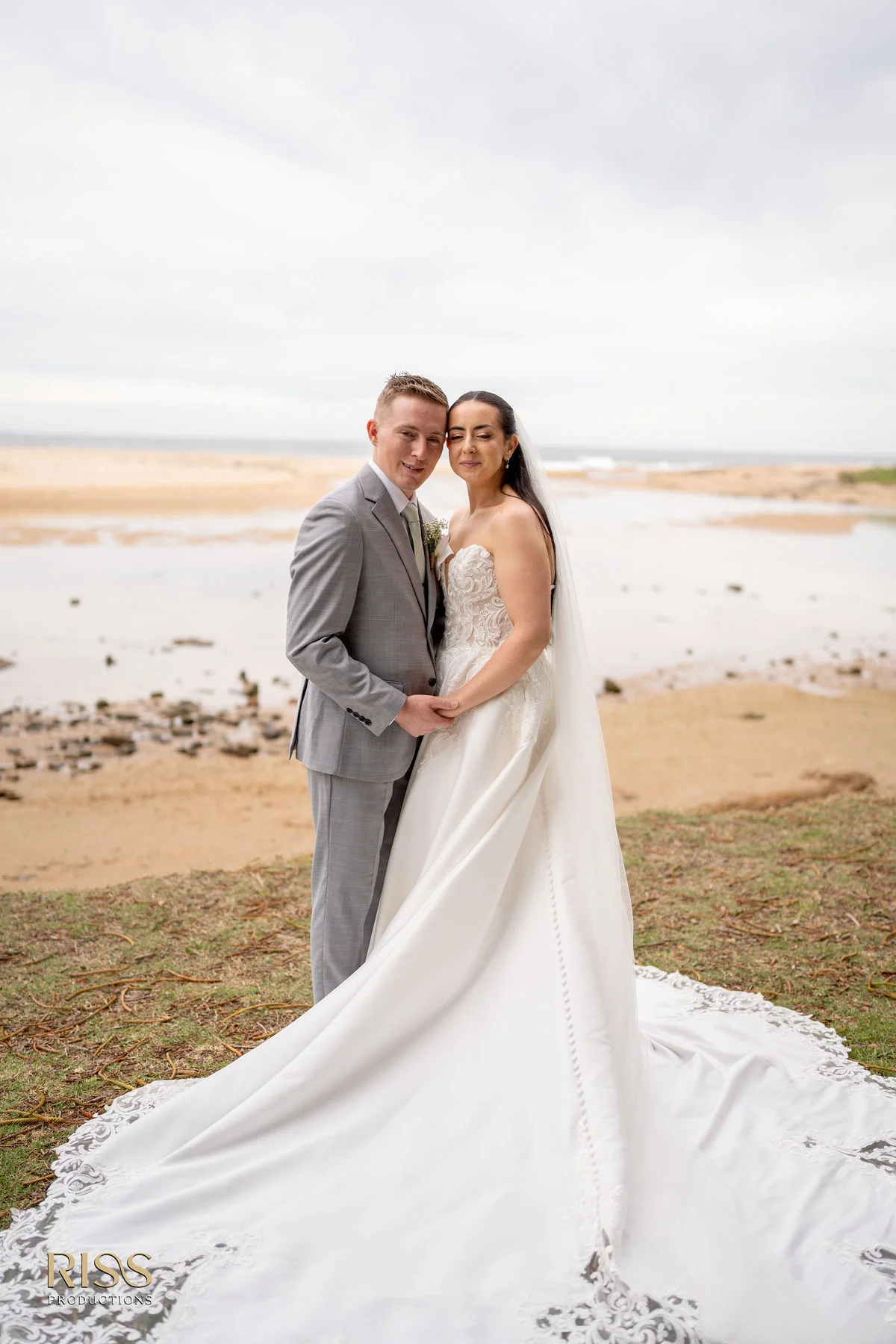 Meghan and Lachlan couple portrait by the water in Wollongong