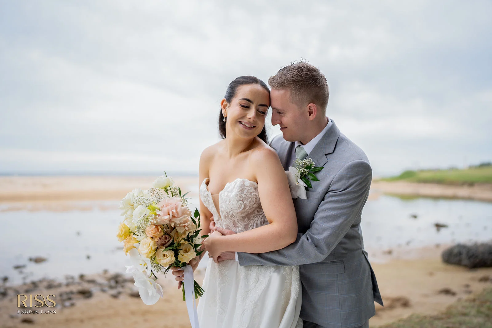 Meghan and Lachlan at sunset by the water in Wollongong