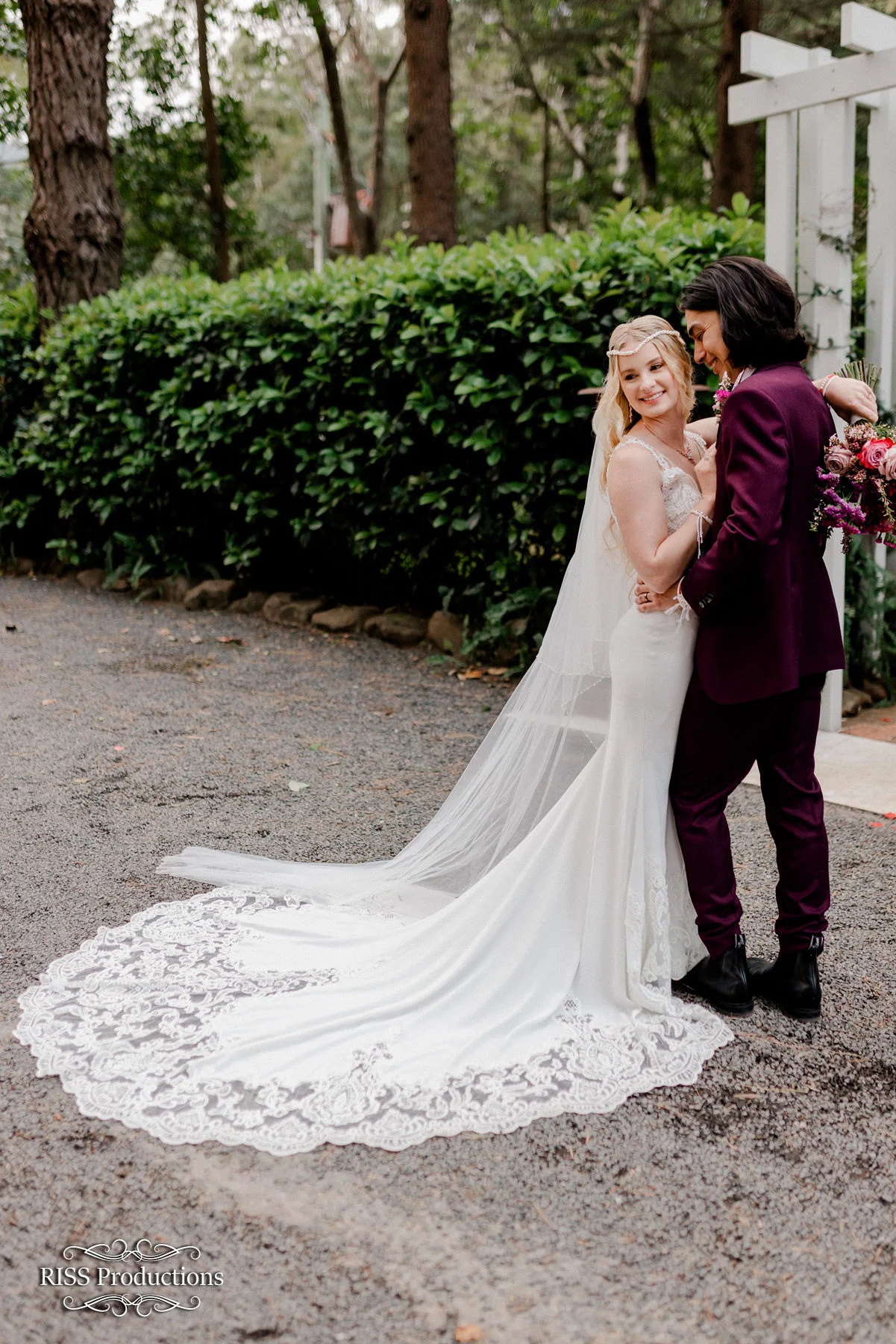 Tom and Zari sharing a moment in the gardens of The Lodge Jamberoo