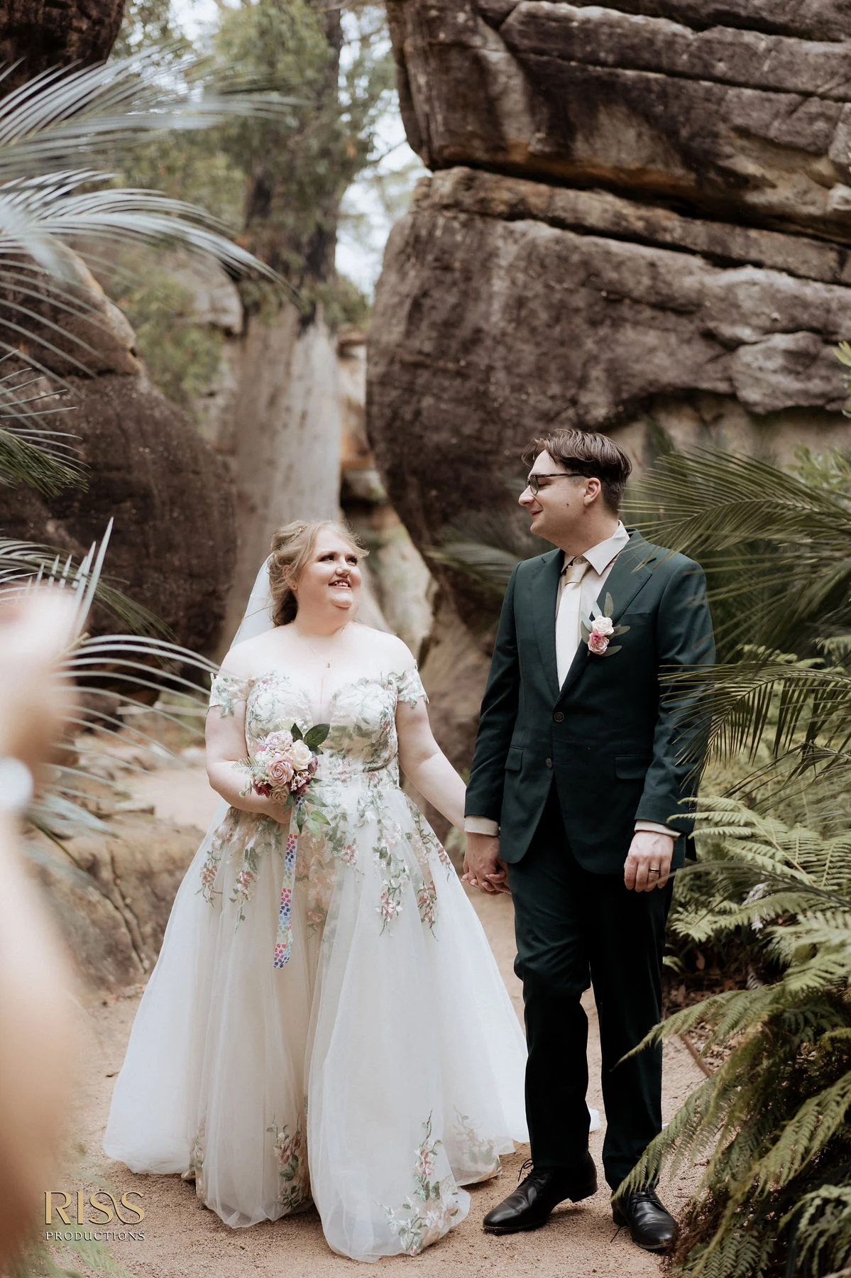 Tiffany and Trent among sandstone rocks and ferns in Kangaroo Valley